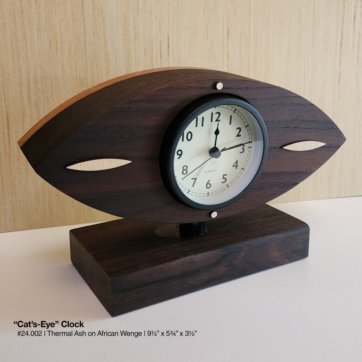 "Cat's-Eye Clock - Thermal Ash"