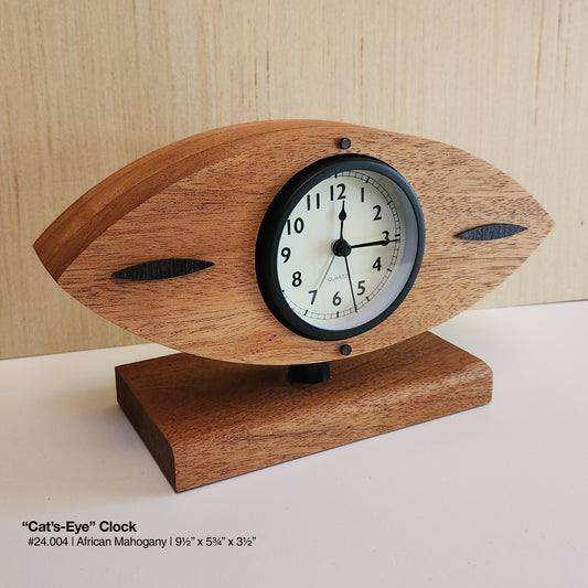 "Cat's-Eye Clock - African Mahogany"