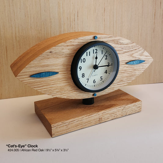 "Cat's-Eye Clock - Red Oak"