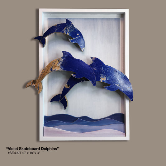 "Violet Skateboard Dolphin Trio"